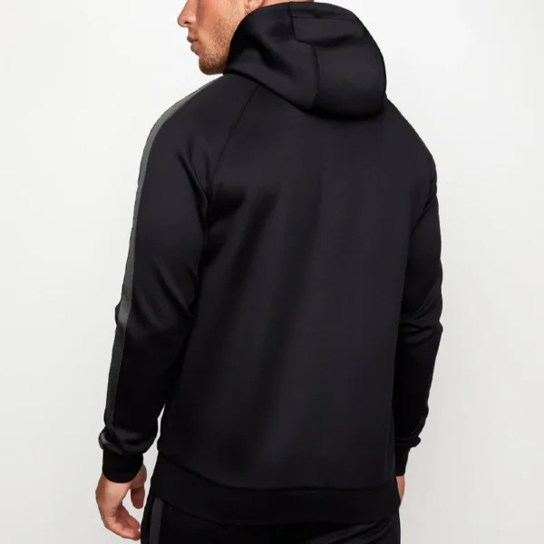 A black tracksuit sold by 100 Spartans