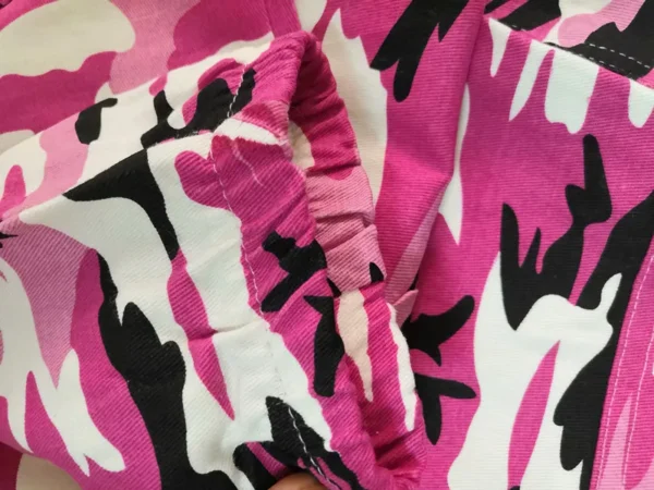 Pink camouflage joggers sold by 100 Spartans