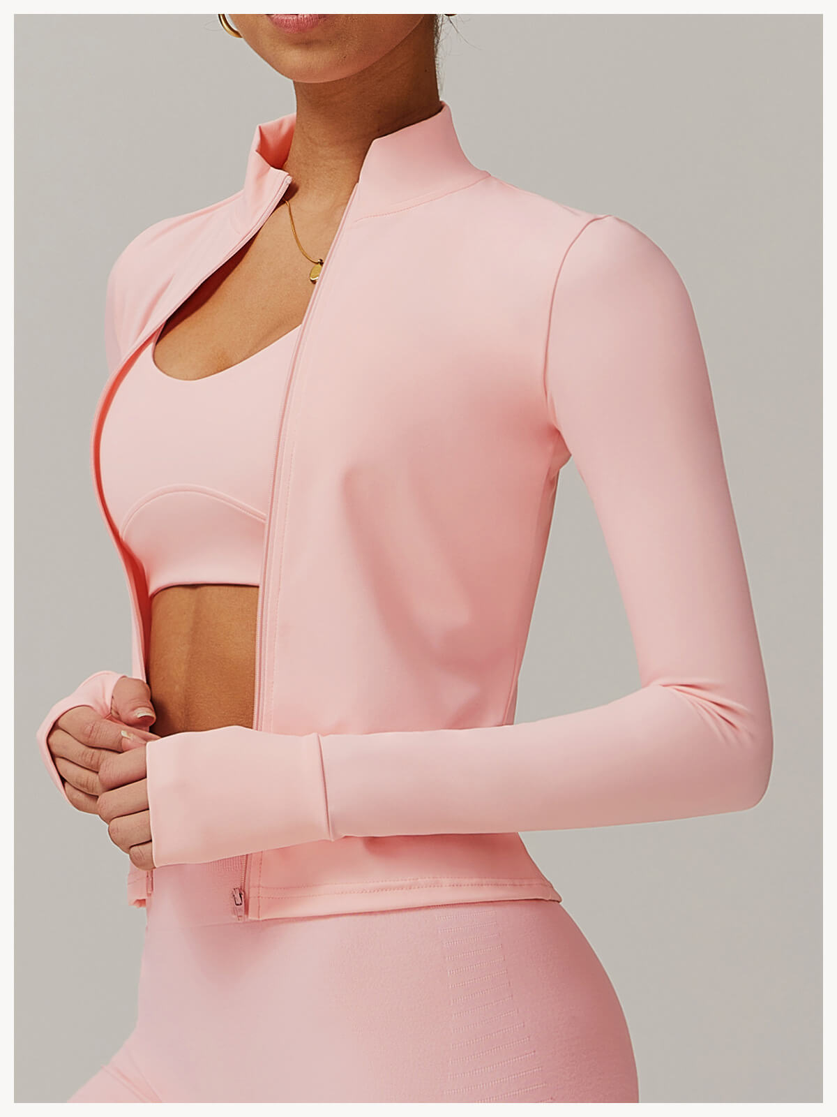 Pink 3 piece womens tracksuit sold by 100 spartans