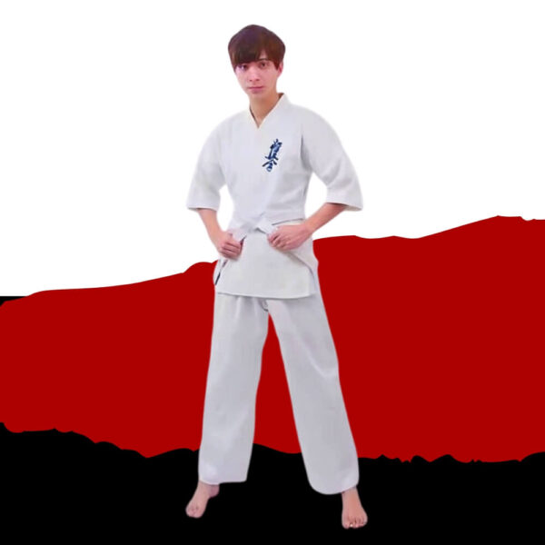 A man wearing a 12oz white Kyokushin Karate Uniform sold on 100 Spartans