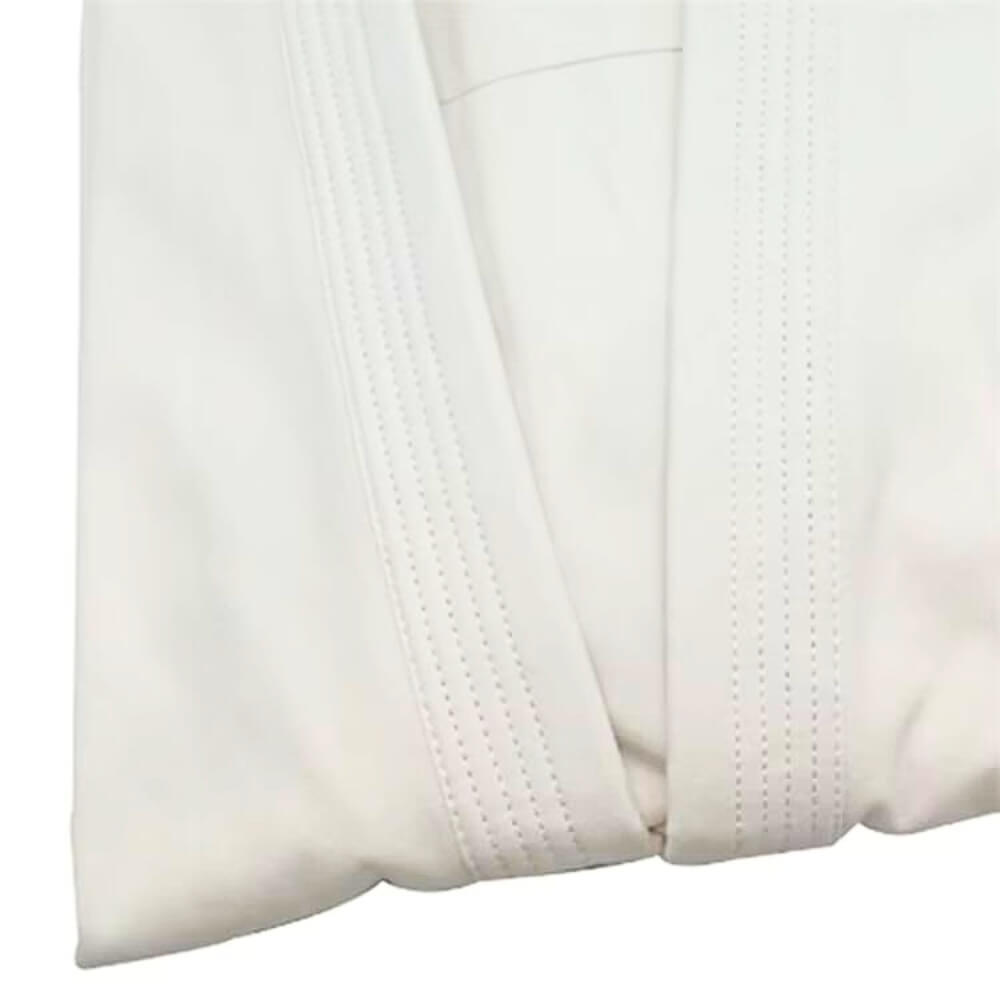 A folded 12oz Kyokushin Karate Uniform sold on 100 Spartans 