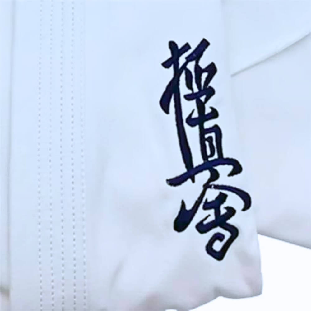 A folded 12oz Kyokushin Karate Uniform sold on 100 Spartans 