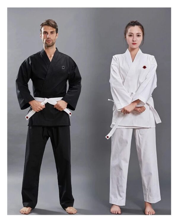 A man and a woman wearing 14oz heavy karate gi sold by 100 Spartans