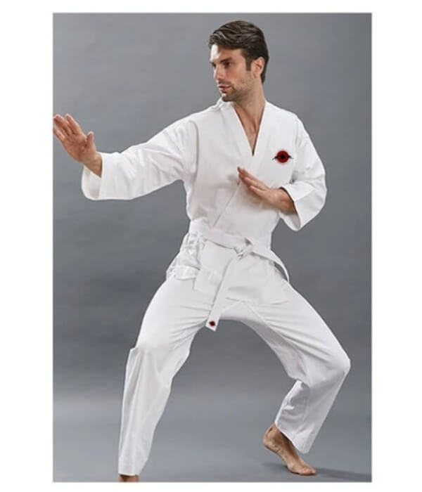 A man training while wearing a 14oz heavy karate gi sold by 100 Spartans