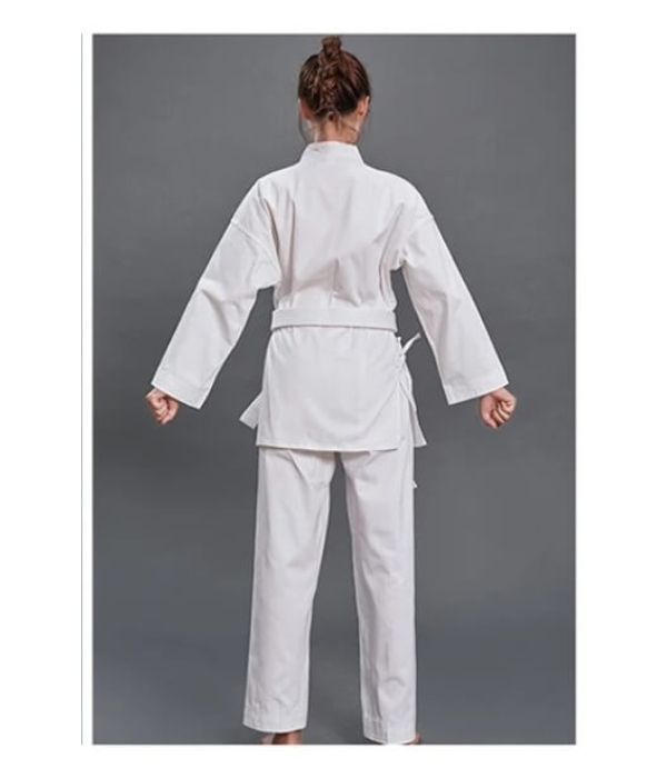 The back view of a woman wearing a14oz heavy karate gi and white karate belt sold by 100 Spartans