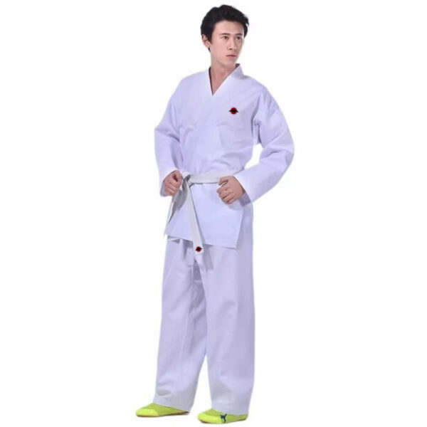 A man wearing a white 9.5oz Kumite Karate Uniform sold by 100 Spartans