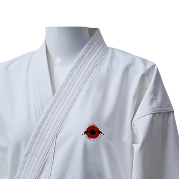 The front view of a white karate gi sold on 100 Spartans